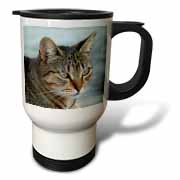 A close up head photograph of a stunning brown tabby cat Travel Mug